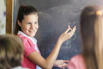 Students playing language art game as a team